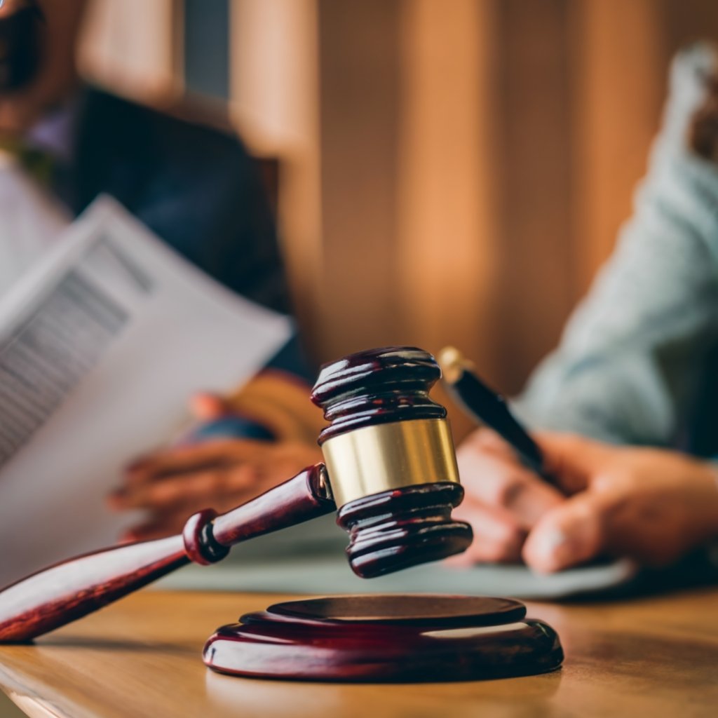 A gavel and legal documents