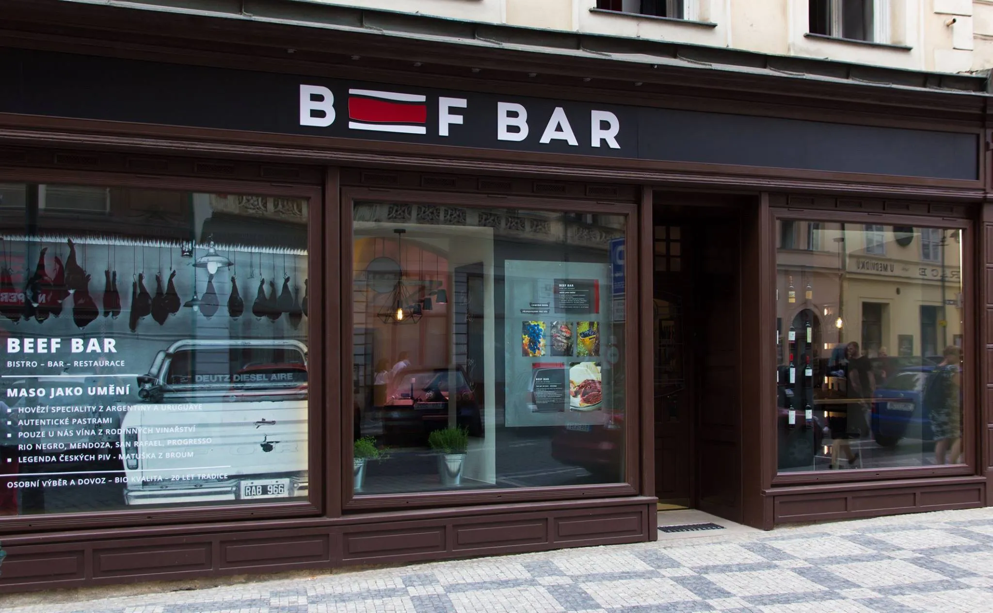 Beef Bar wordmark and meat-cut detail applied to the restaurant environment