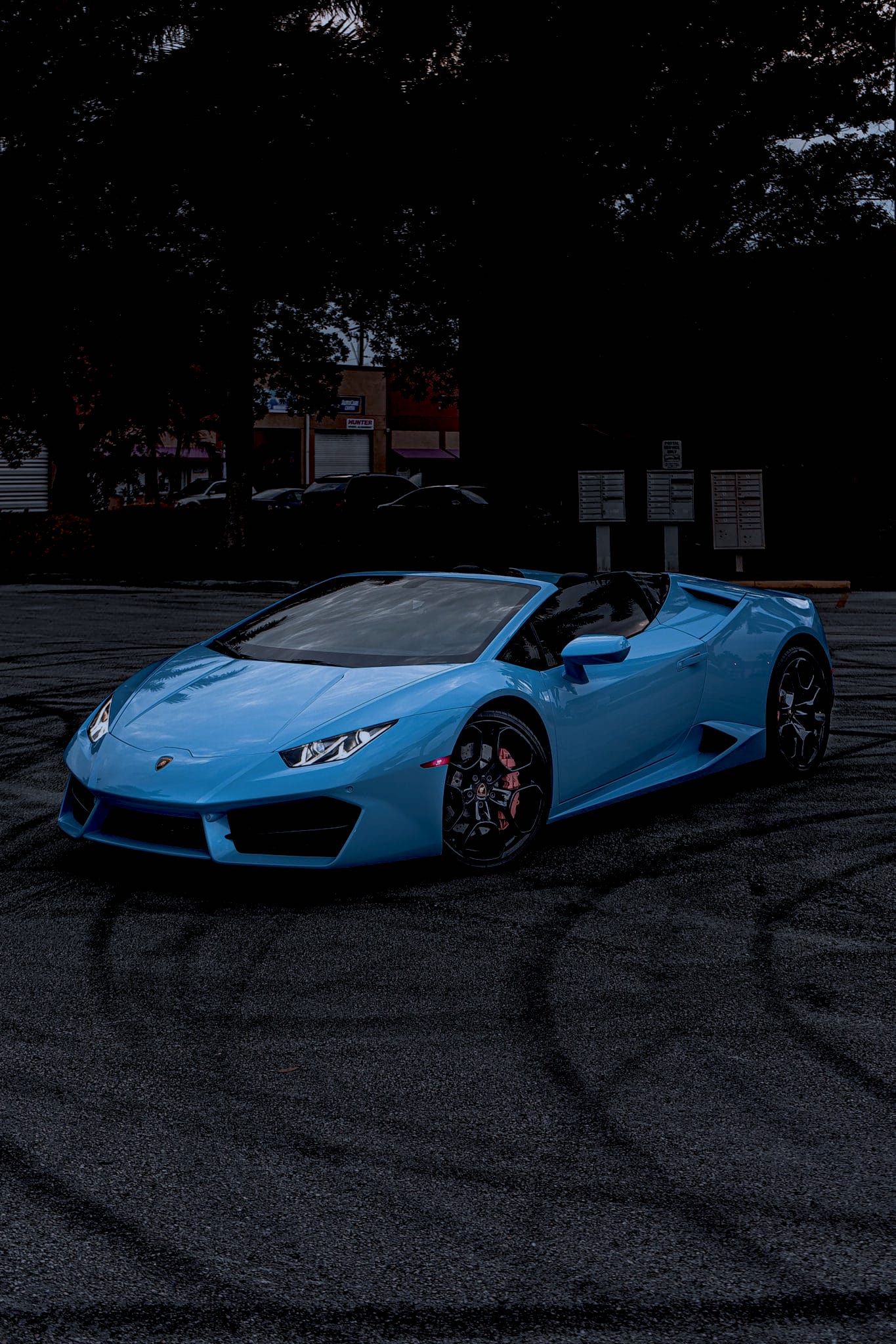 Fresh detail on a blue sports car with an interior and exterior detail and vacuuming in southwest florida