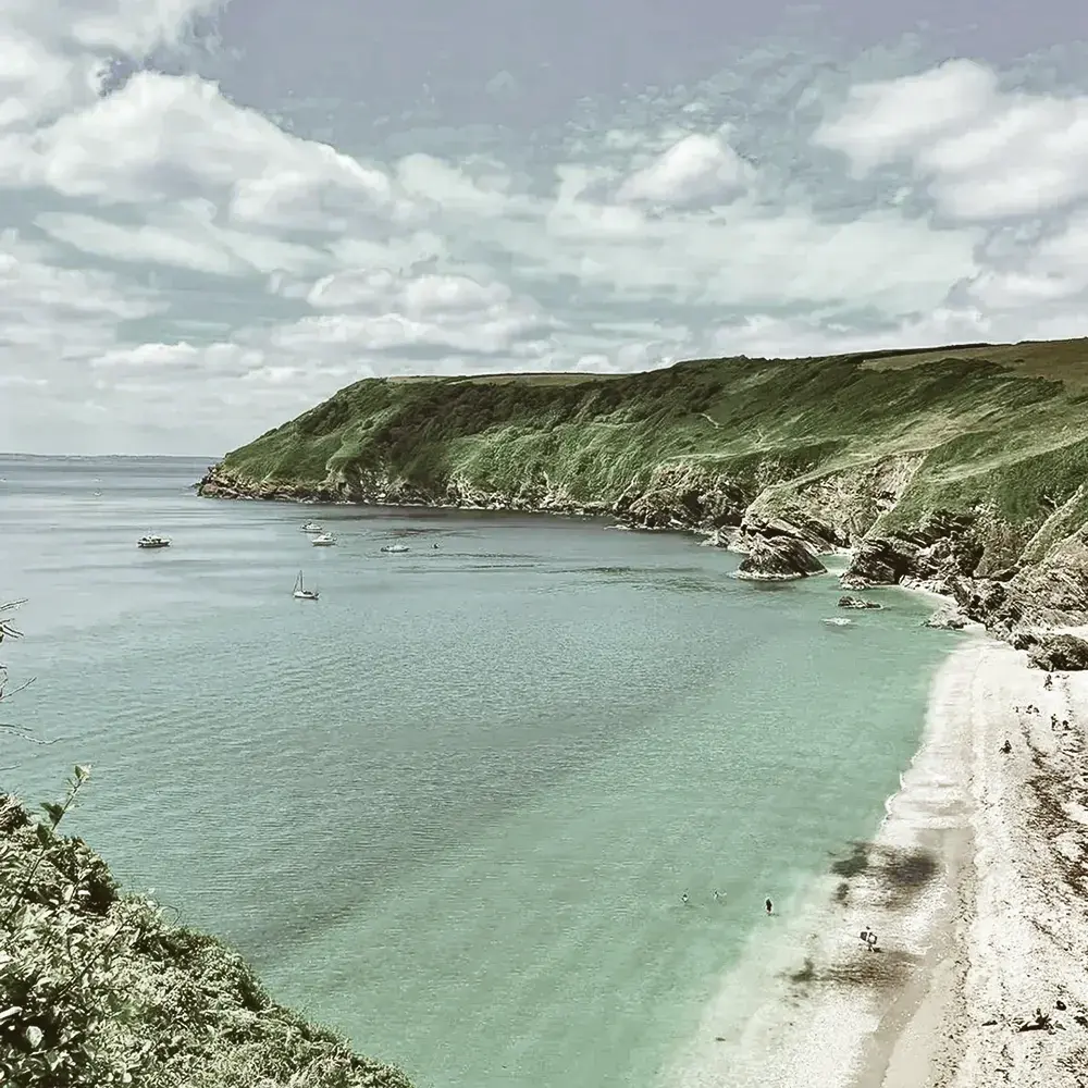 Cozy sleeping bed high in the mountain with a sunset view