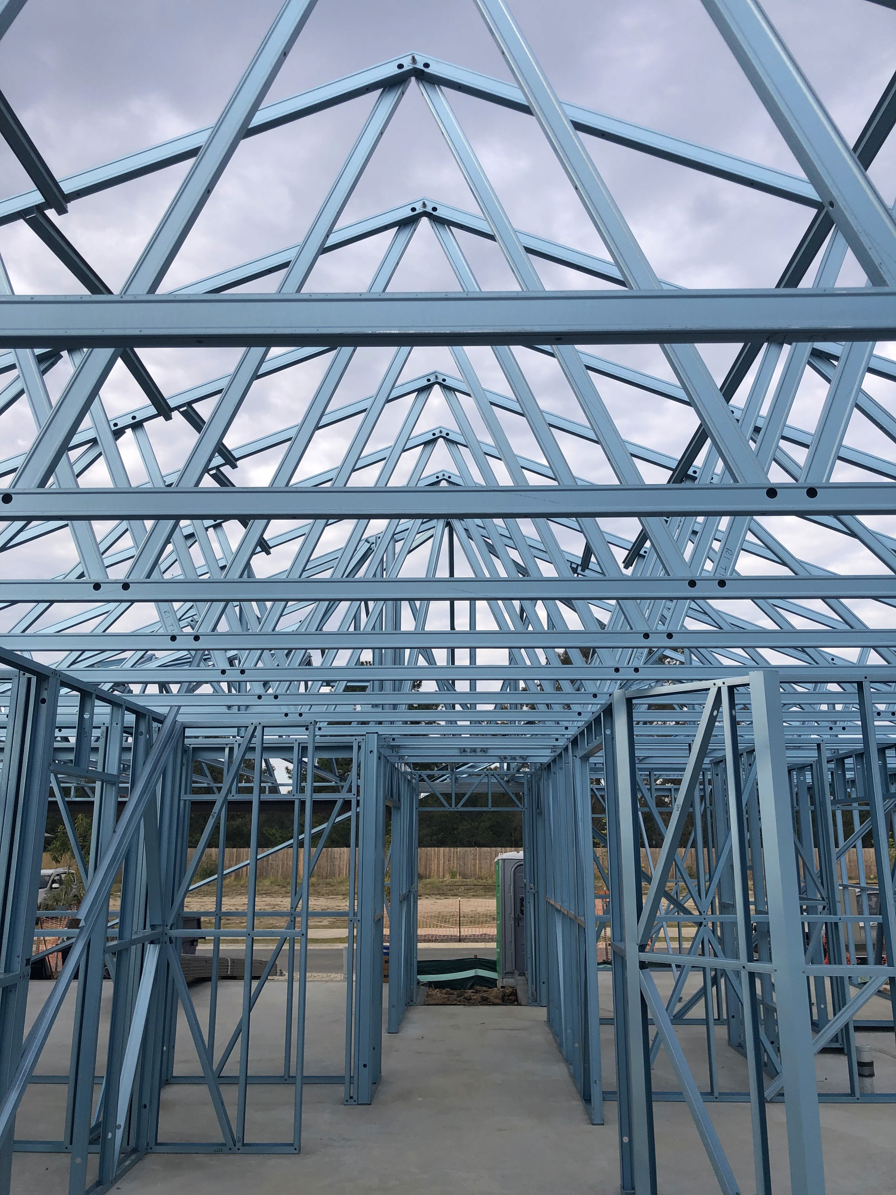 Ben from Ohana plumbing Sydney doing drainage cleaning in front of his vehicle