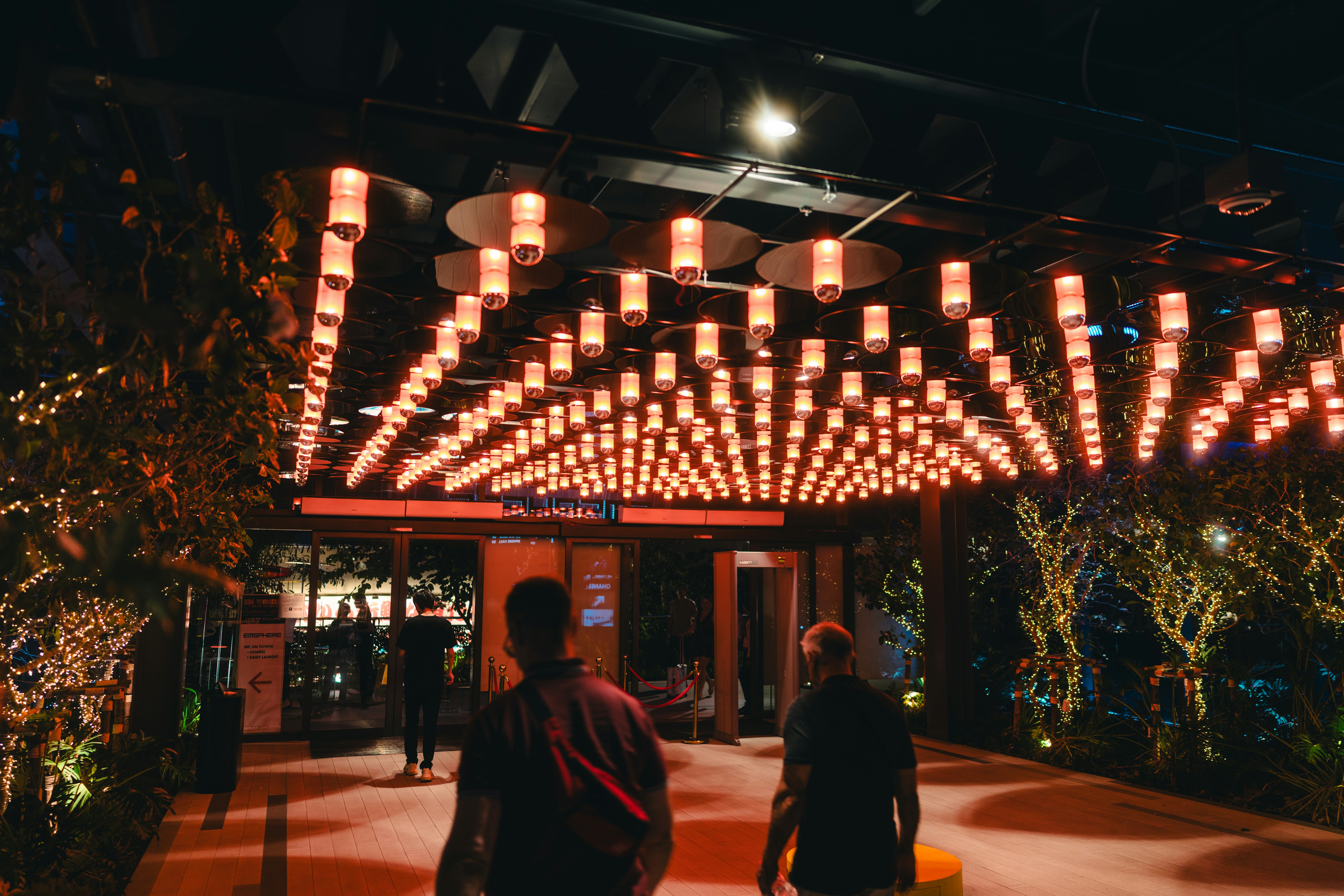 Row of orange glowing lights above entrance