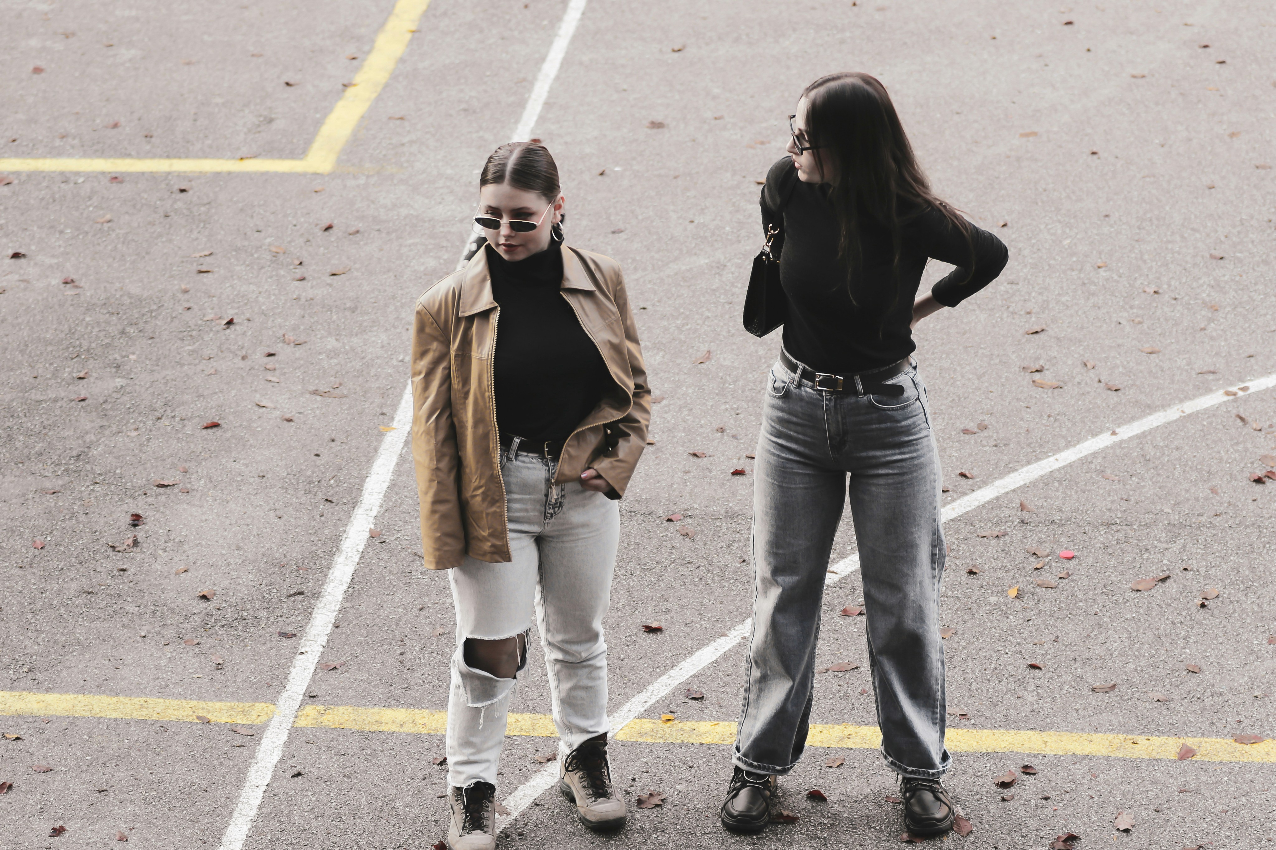 Two fashion models standing for photoshoot