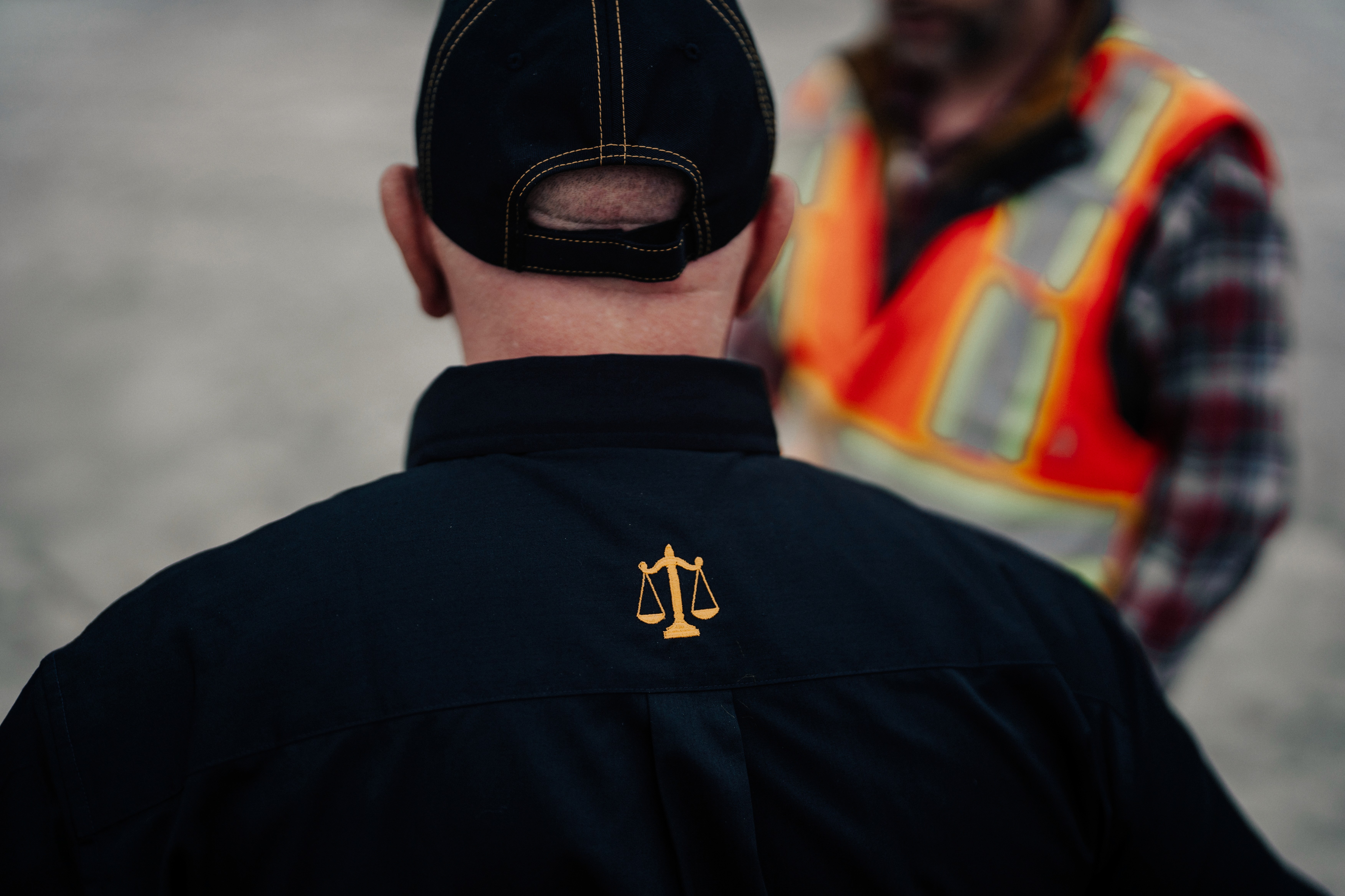 View of containers in motion at a large logistics hub located in a port.