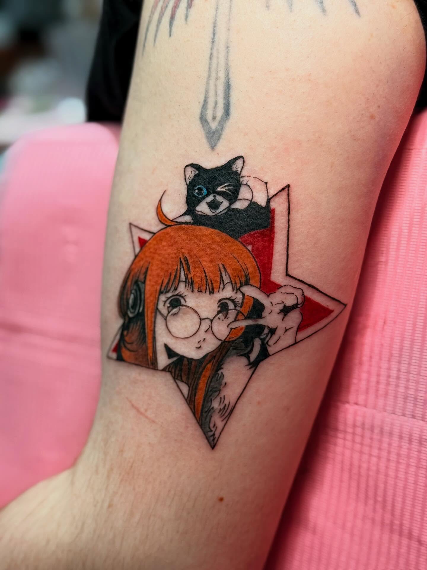 A grayscale anime-style tattoo of a character with spiky hair and a headband, holding a kunai.  The tattoo is on someone's forearm.