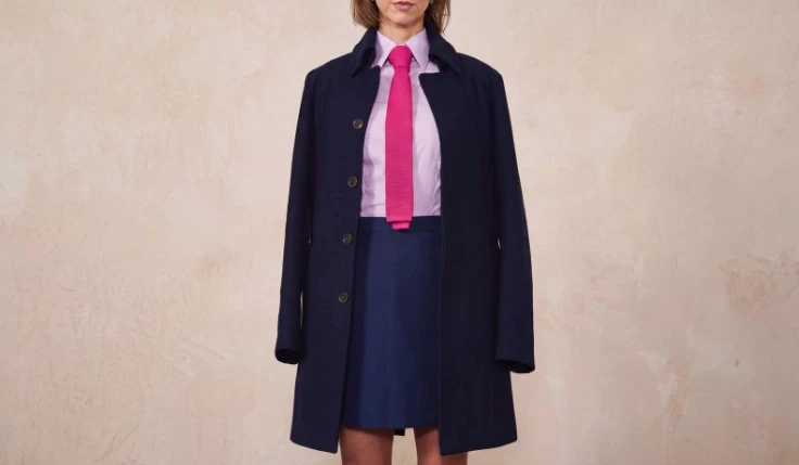 Androgynous suit design featuring balanced masculine and feminine tailoring elements