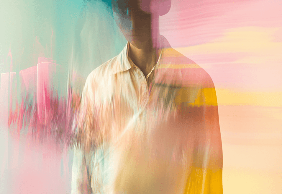 A woman walking down a street, with a blurred background creating a sense of motion and depth.