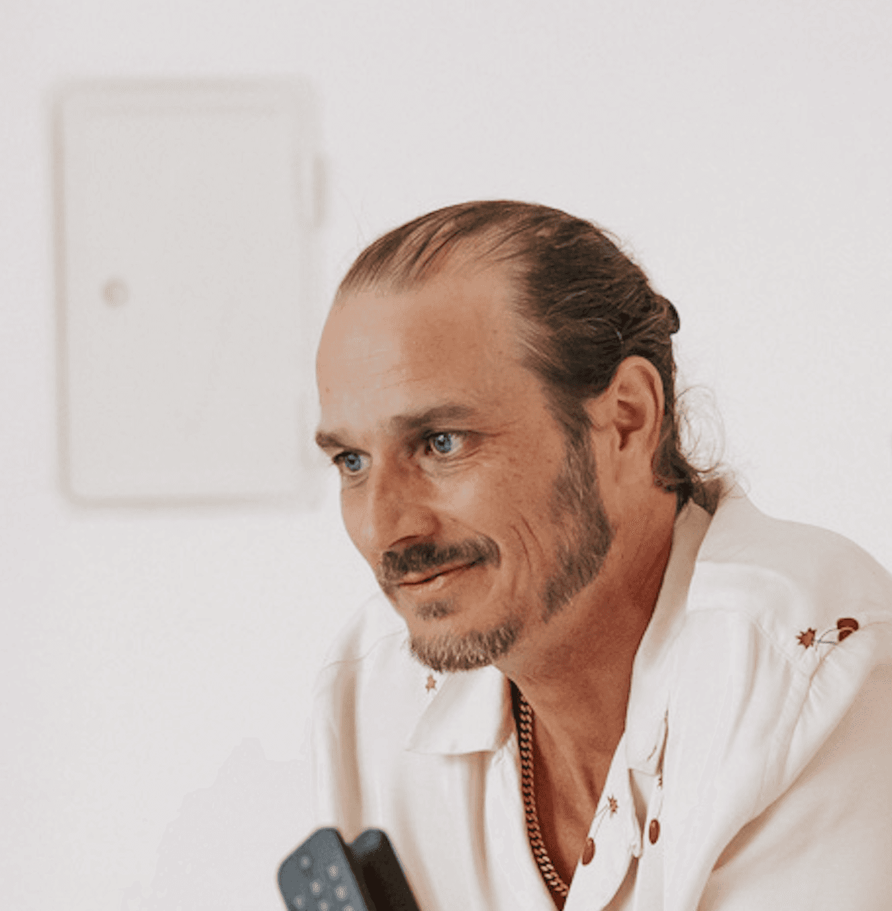 Colleague listening attentively during a workshop discussion.