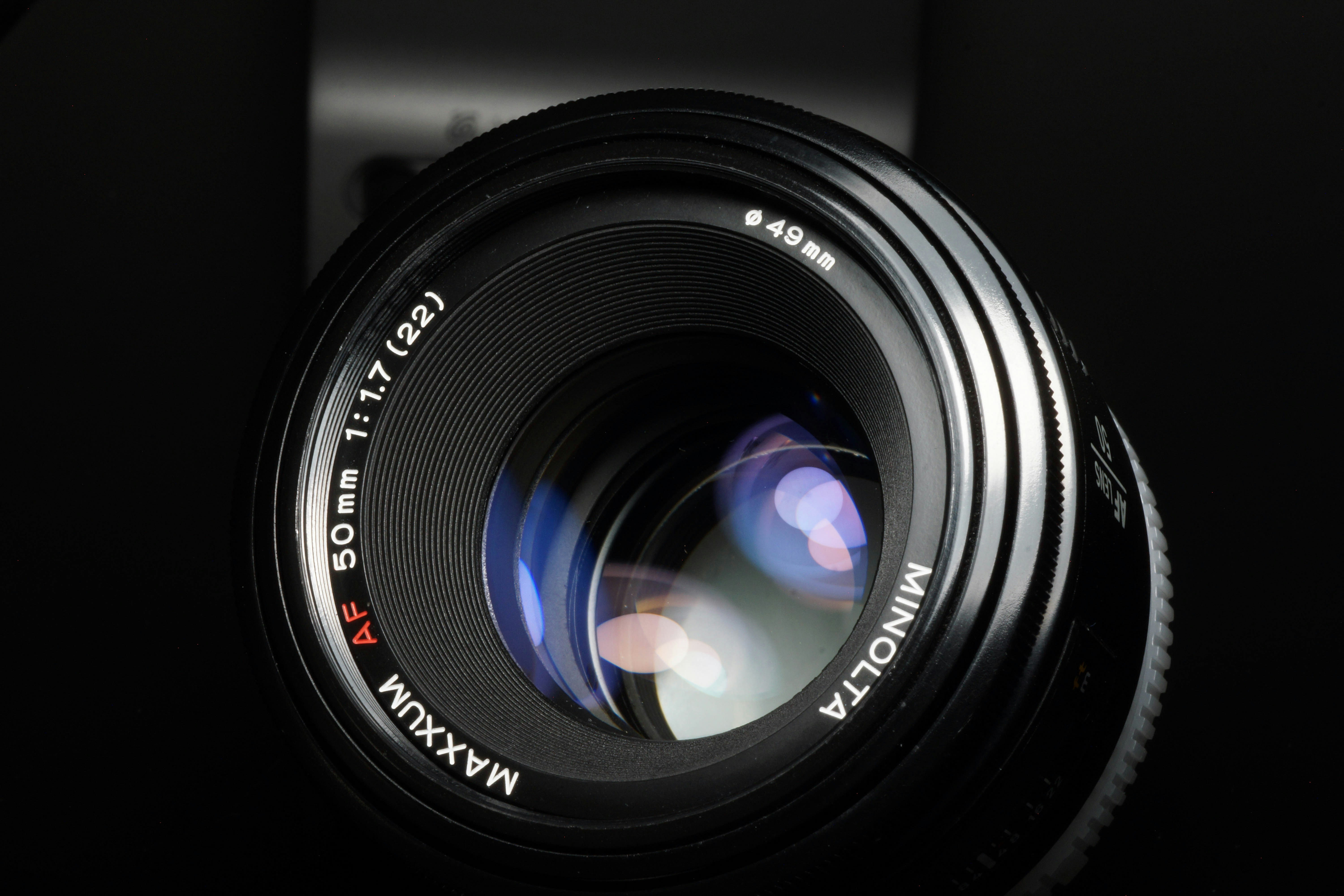 black nikon camera lens in close up photography