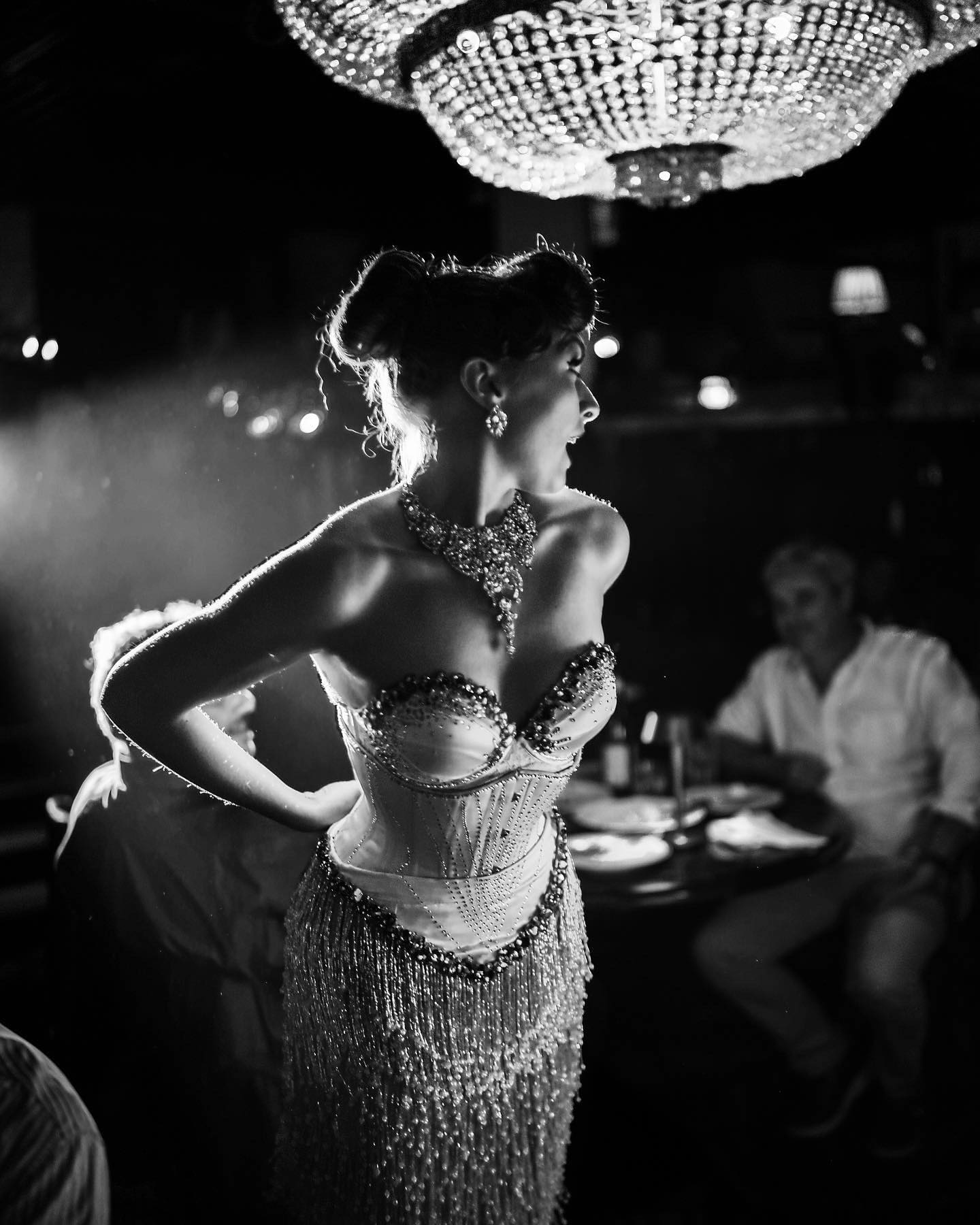 two people looking at a tablet and smiling