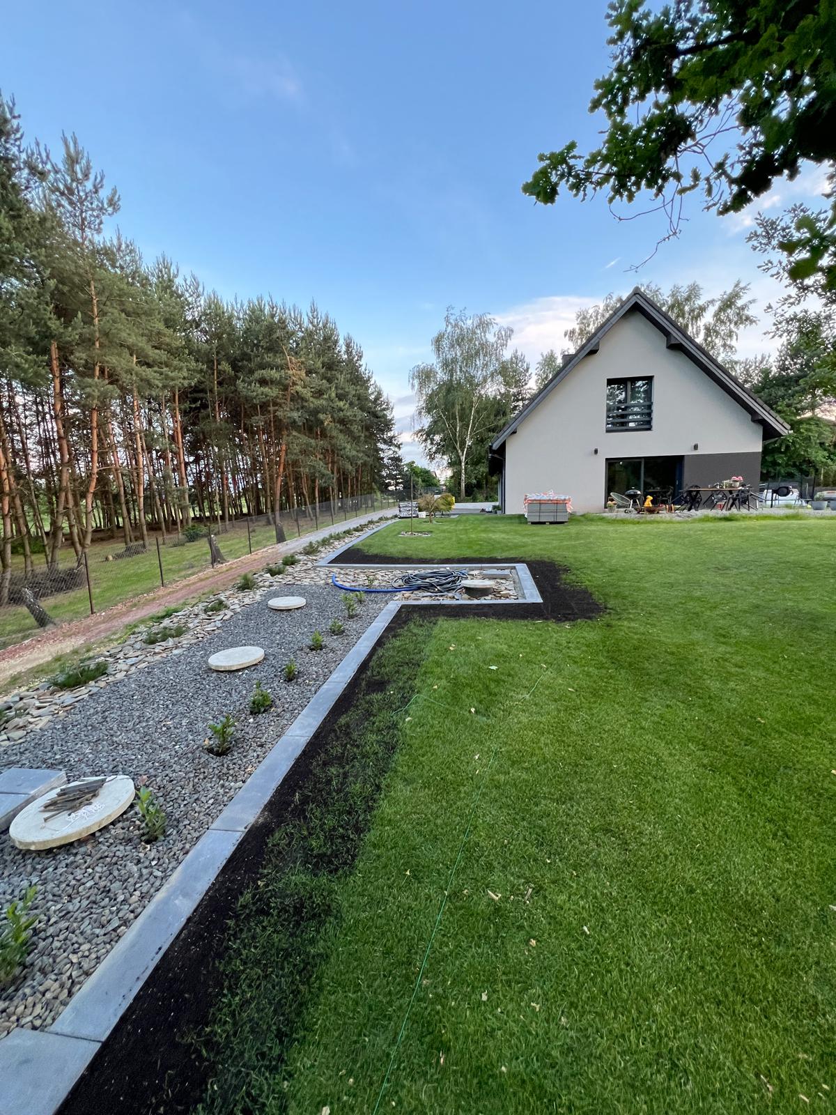 Beautiful landscaped garden with greenery and outdoor design elements.