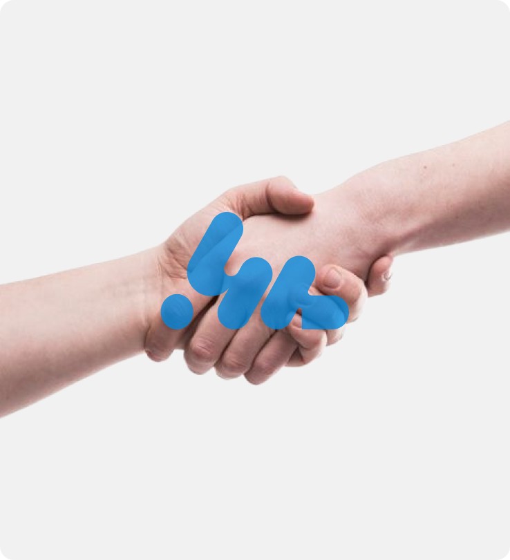 Female scientist wearing a white coat and gloves examines a sample slide in a modern laboratory setting.