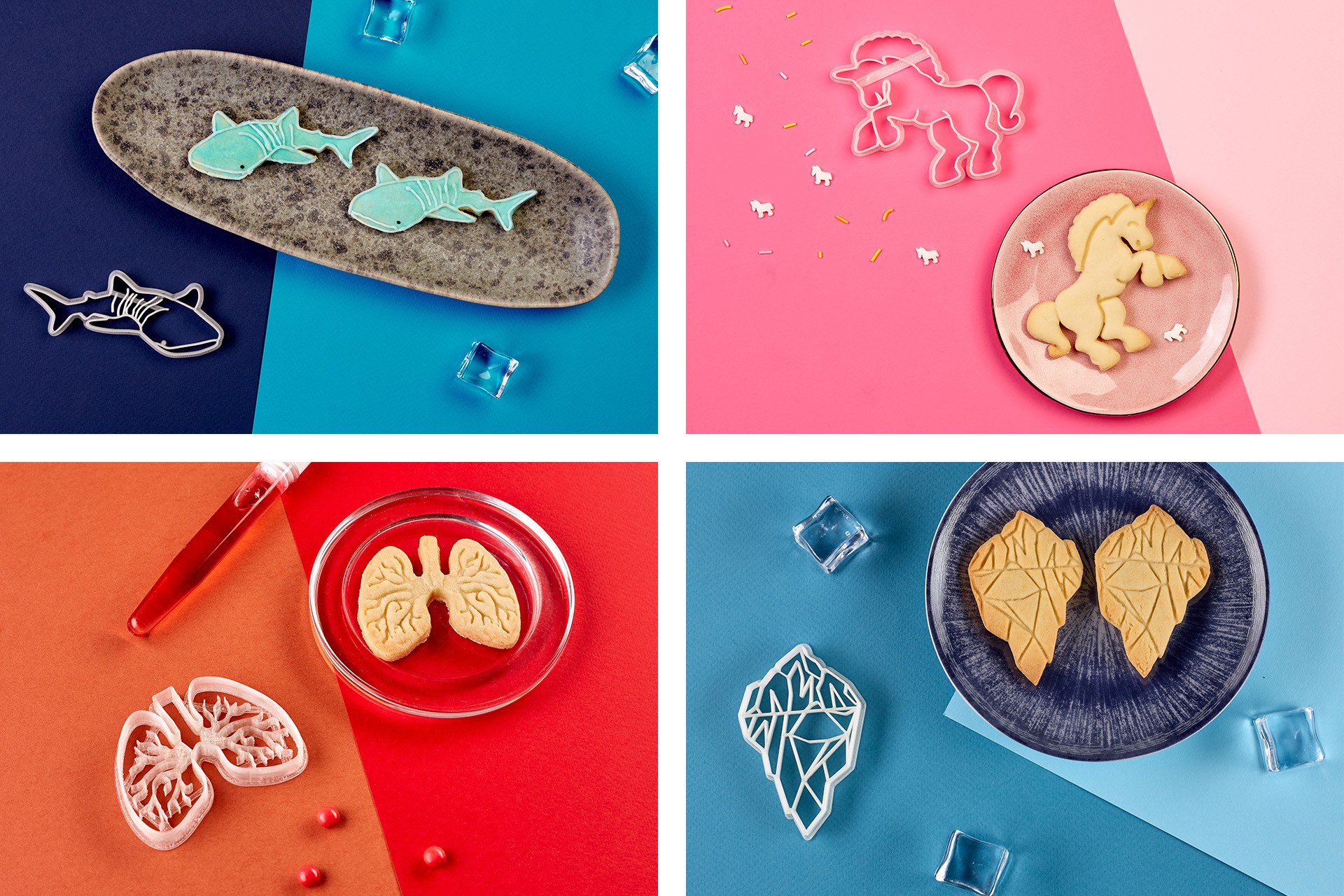 Four images featuring creatively shaped cookies highlight the versatility of Biocraftlab cookie cutters: Blue plates feature fish-shaped cookies against a vibrant background; Pink unicorn-shaped cookies are displayed on a matching pink paper; Red lung-shaped cookies are elegantly placed beside a red liquid in a glass container; Iceberg-shaped cookies appear on a blue dish accompanied by ice cubes.