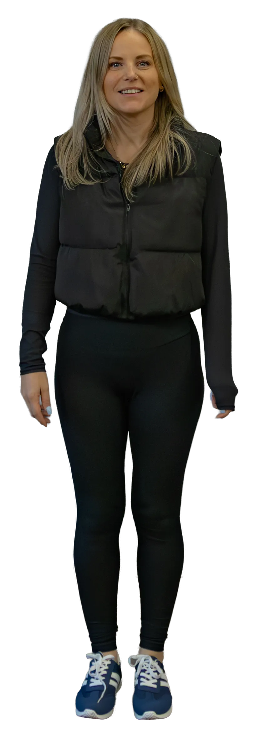 woman in black long sleeve shirt sitting on white couch