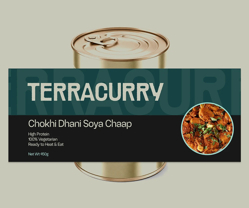 A flat label for a TerraCurry can of "Chokhi Dhani Soya Chaap", marked "High Protein, 100% Vegetarian, Ready to Heat & Eat, Net Wt 450g", wrapped round a gold can.