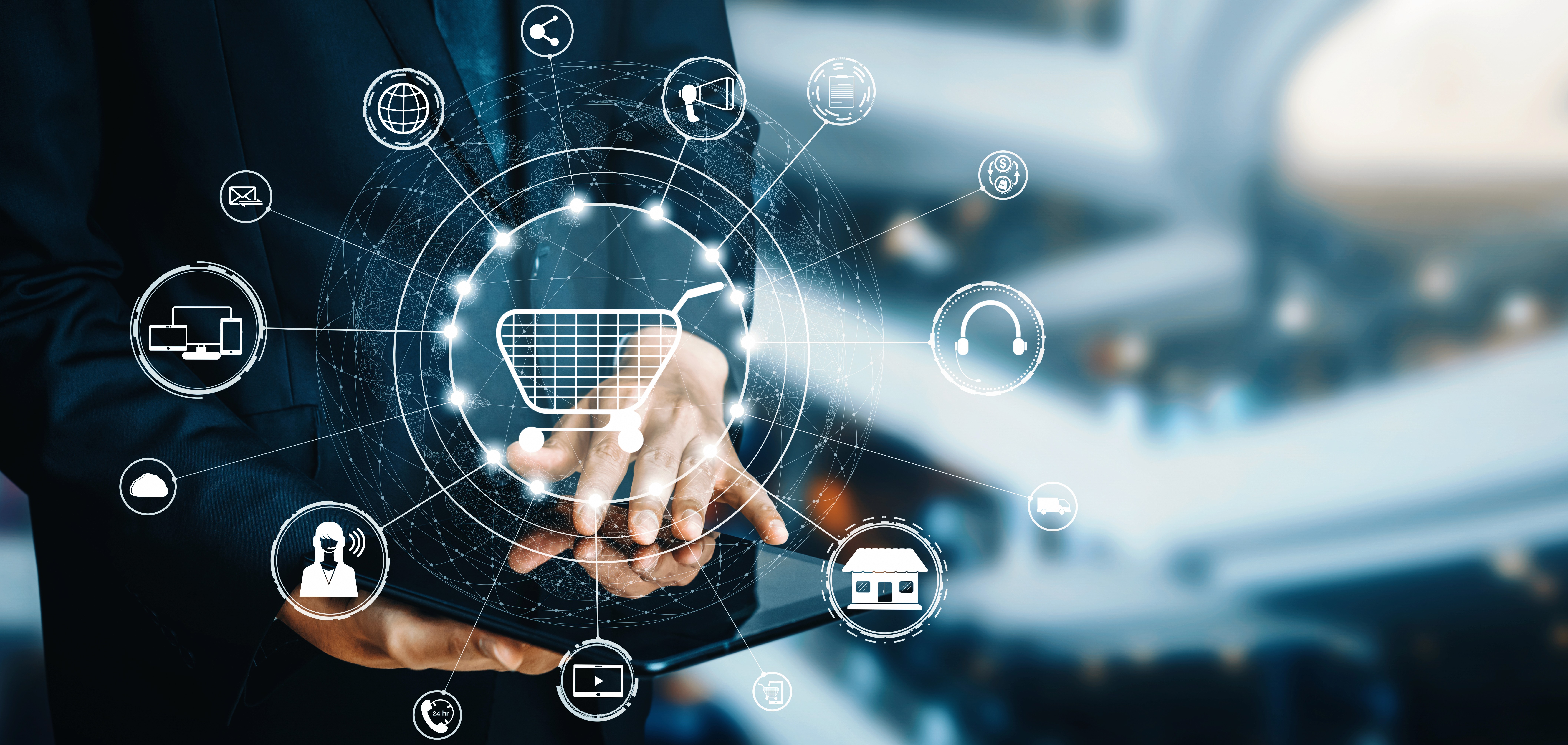 woman in blue tank top standing beside white wall