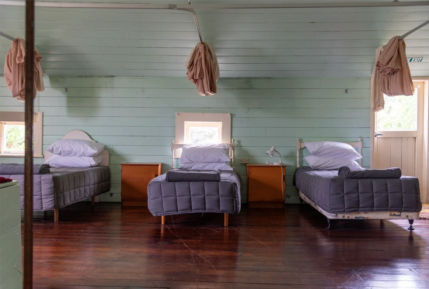 Bedroom with three single beds