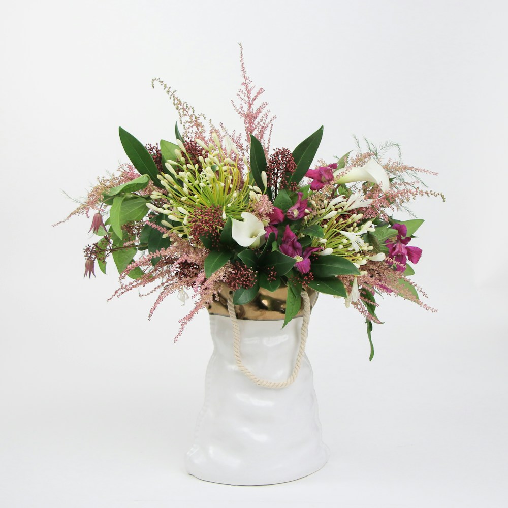 Bouquet of flowers in a white vase