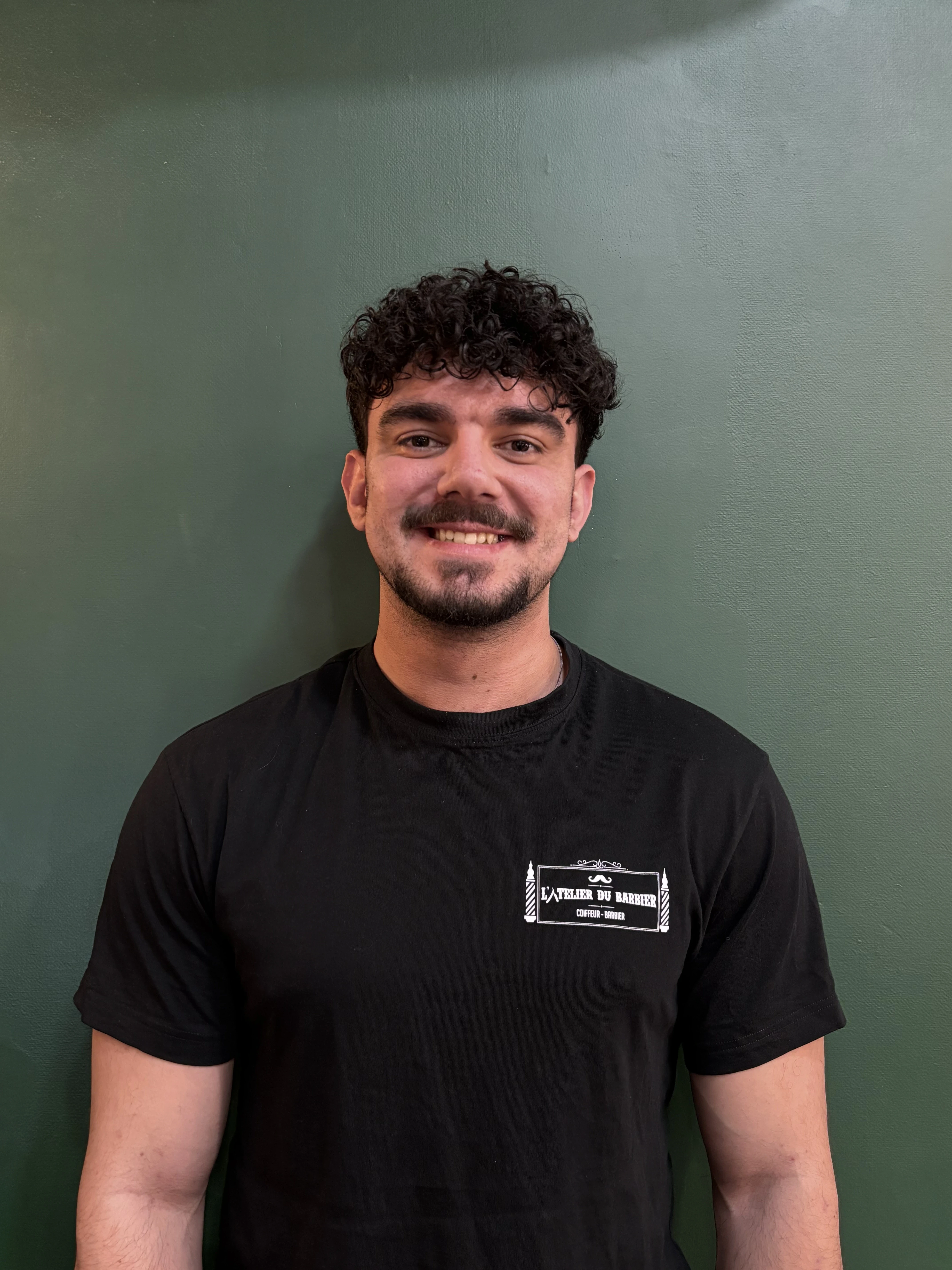 woman standing near blue steel gate