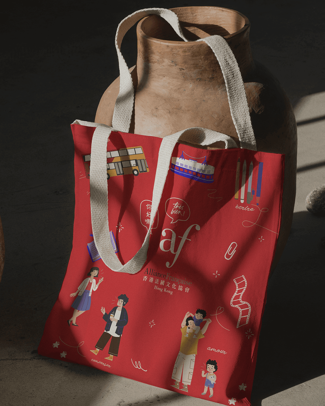 Streetside billboard with flyposters of the Batch.Works brand and illustrations