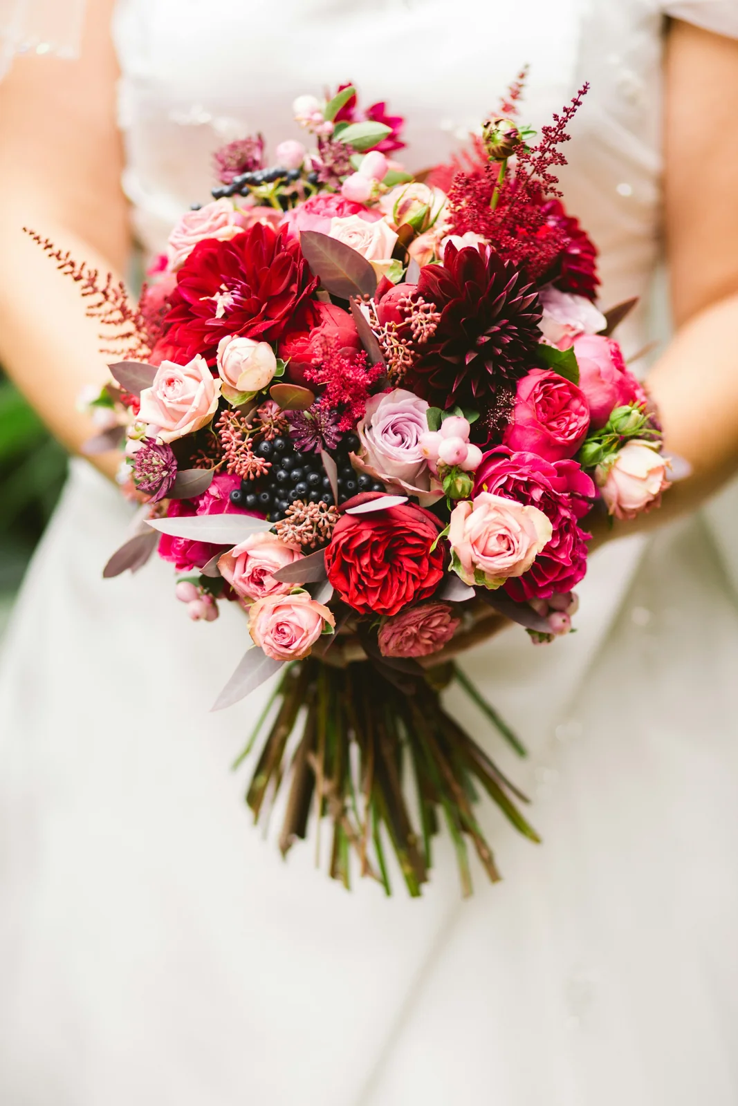 A red and pink bridal bouquet
