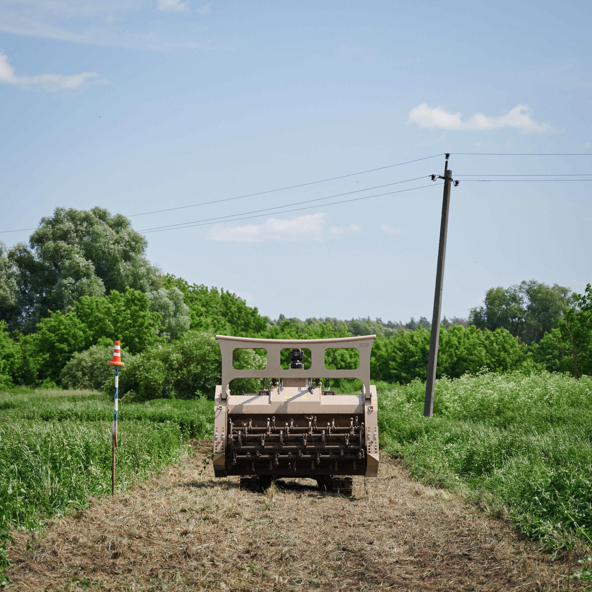 GCS-200 remote-controlled platform with tiller attachment during battle area clearance operations.