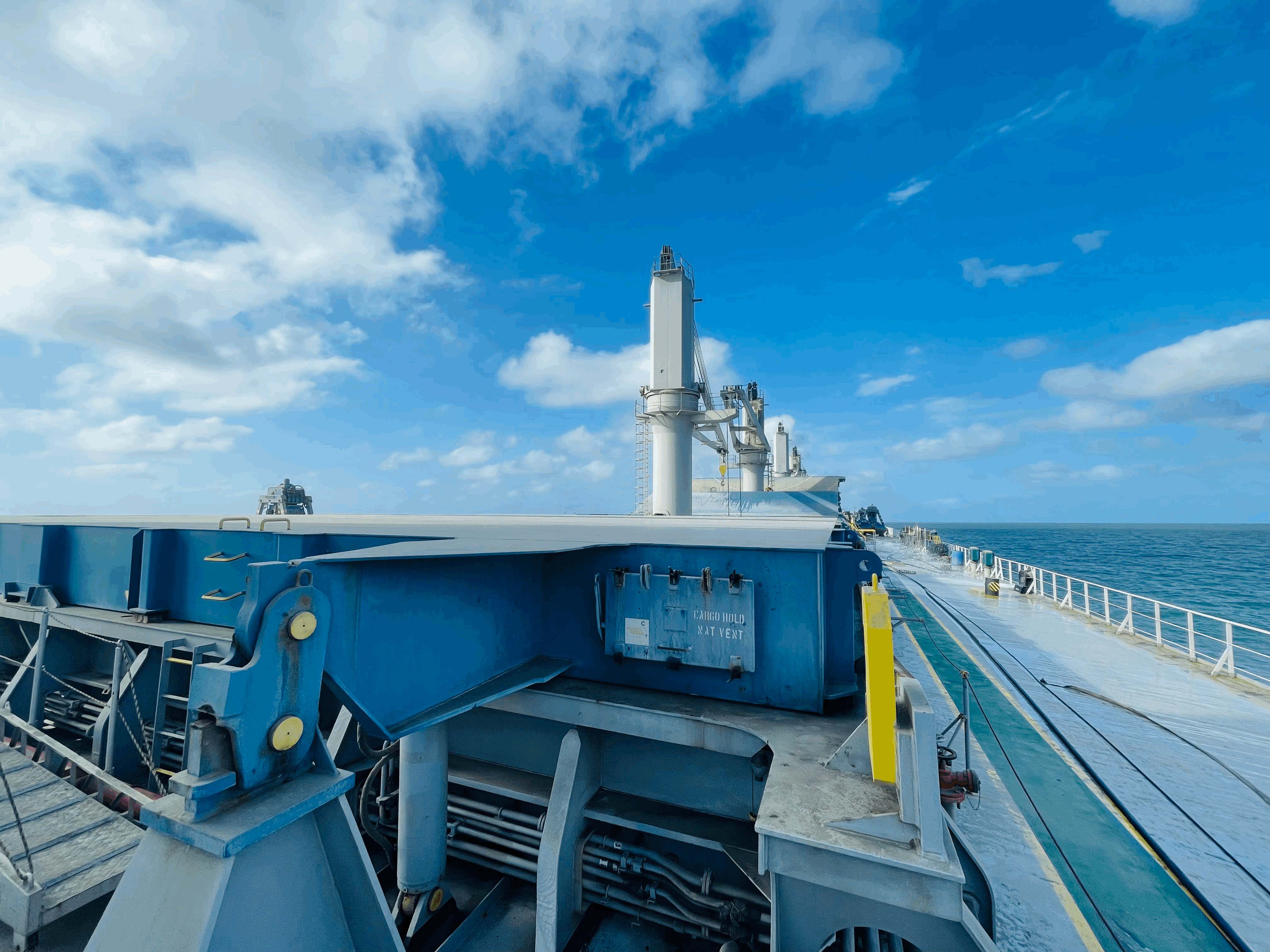 Deck view on M/V Falcon Trader at Pecém anchorage during cargo hold cleaning, with condition survey evidence capture planned after completion.
