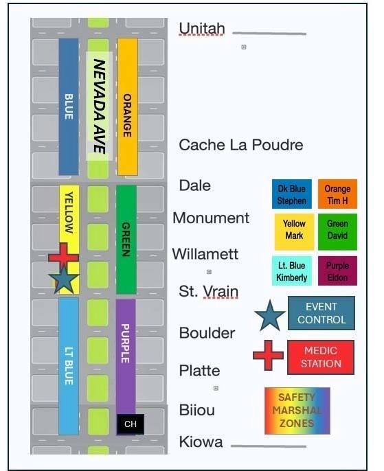 Credit: Trish Kantor. A protester with a backpack and American flag stands in front of a crowd.