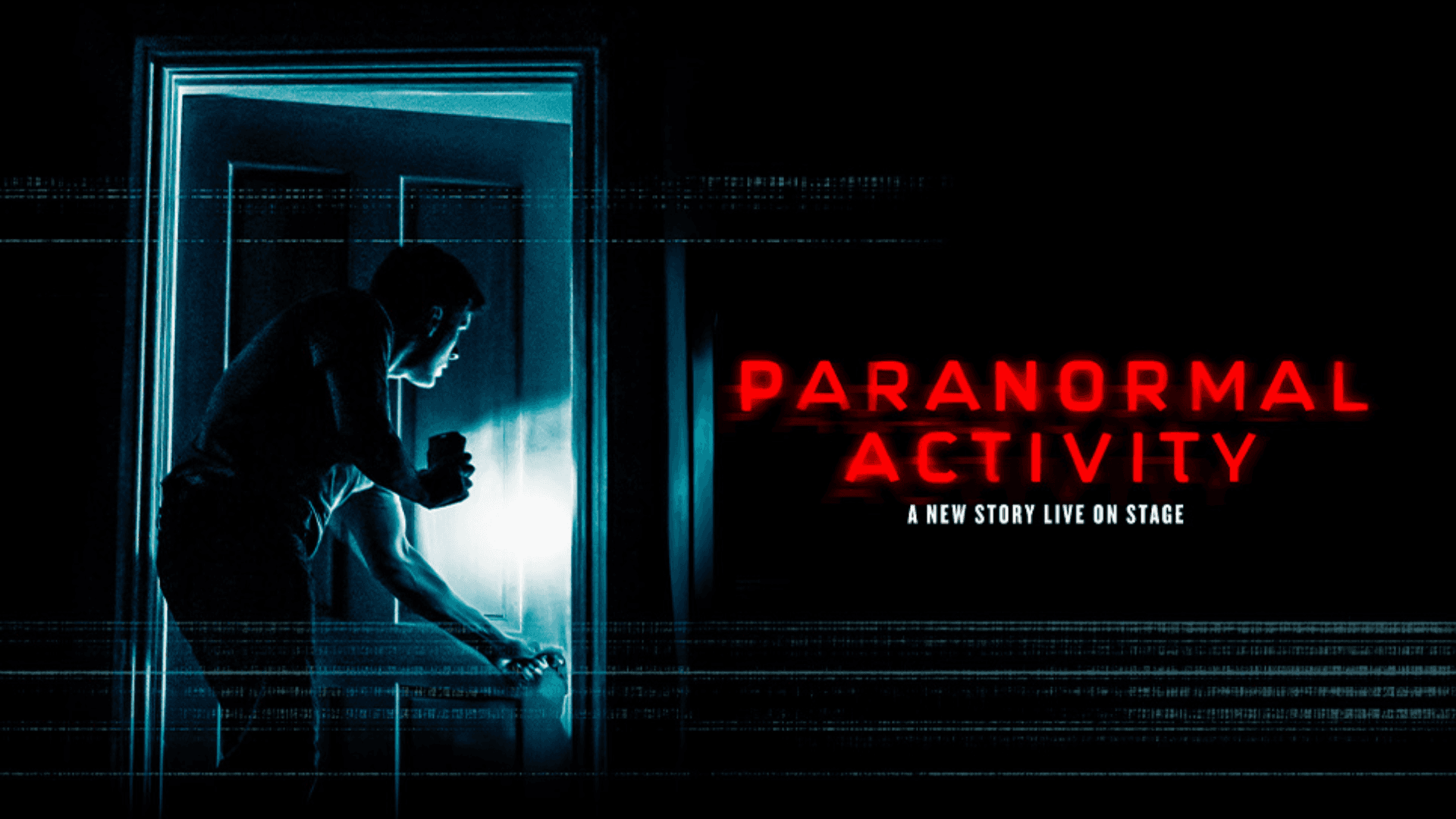 Man with flashlight opening door, Paranormal Activity West End show.