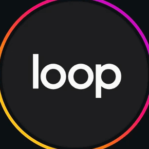 A person with short, curly blond hair wears a bright orange turtleneck sweater. The background is plain, creating a calm and focused portrait look.