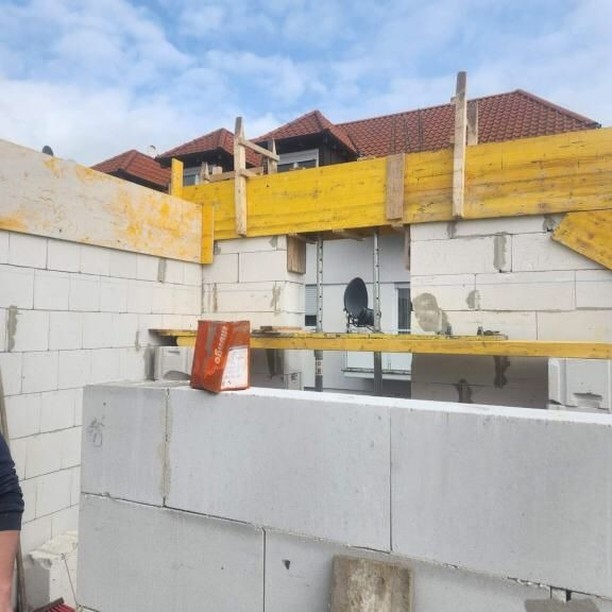 Outdoor Café Seating in a Sunlit Alley