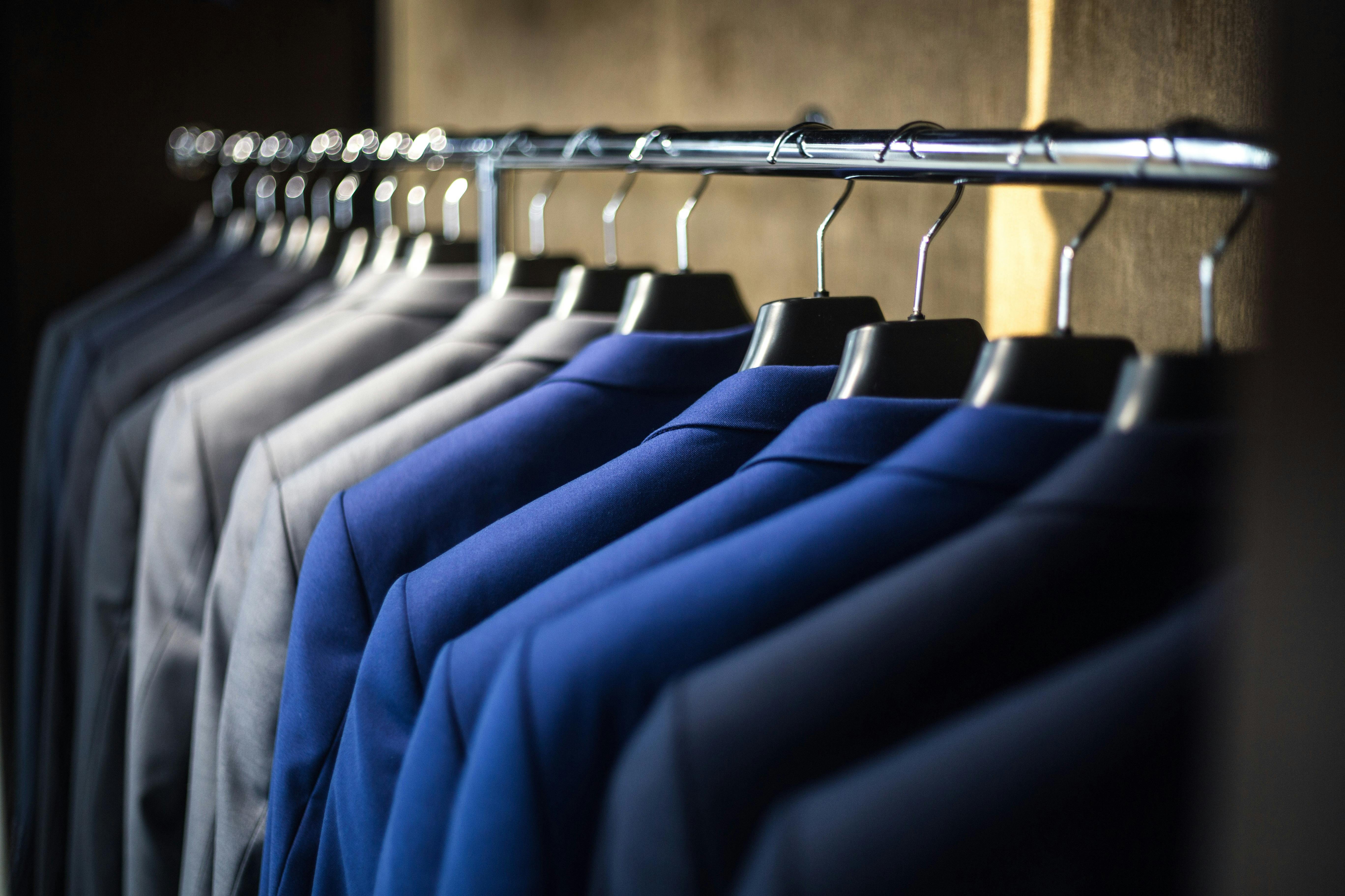 Suits neatly hung 