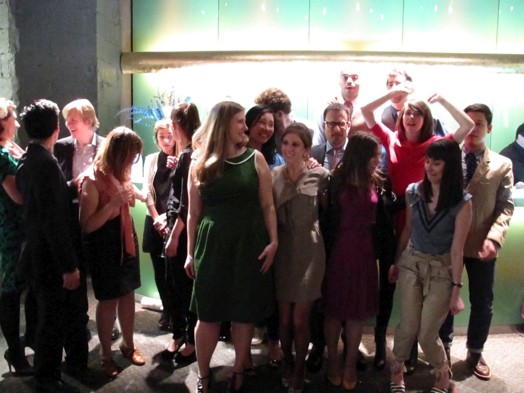 group photo of young people at the exhibition gallery