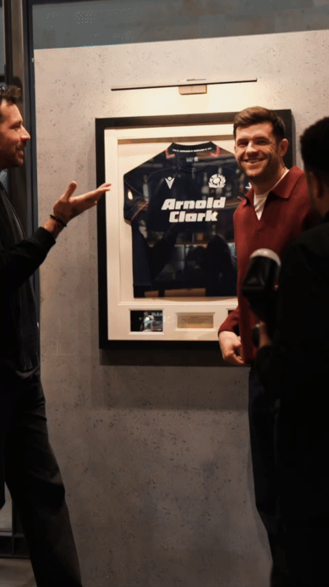 Bride in white dress walking on street, blurred motorcycle passing