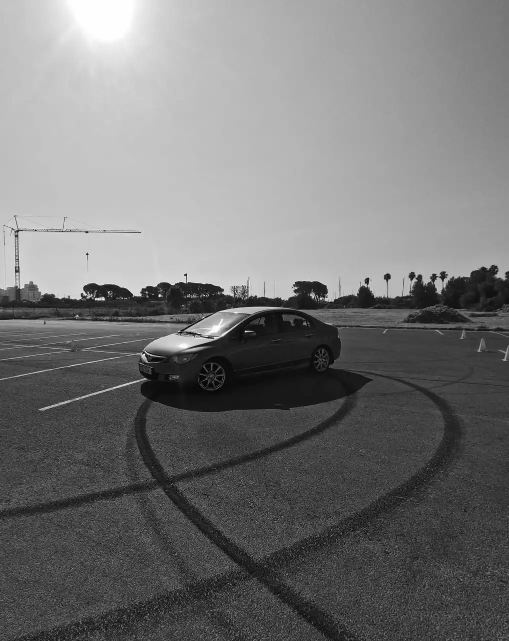 gray mercedes benz coupe on black asphalt road during daytime