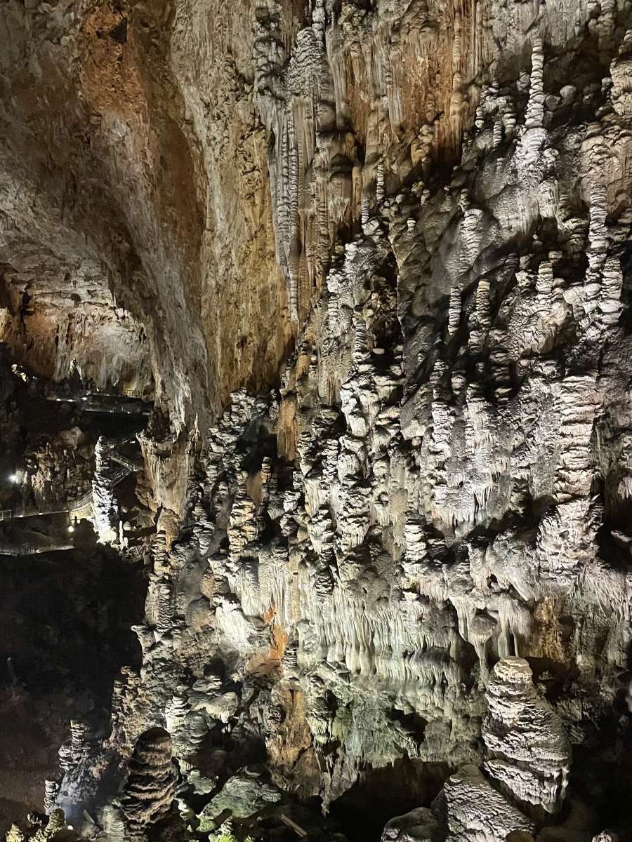 three brown wooden boat on blue lake water taken at daytime