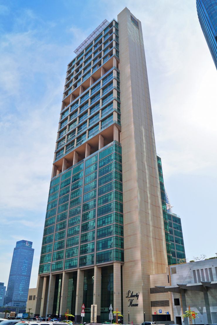 Liberty House entrance. Expert real estate agents helping you find the perfect home in this iconic tower.