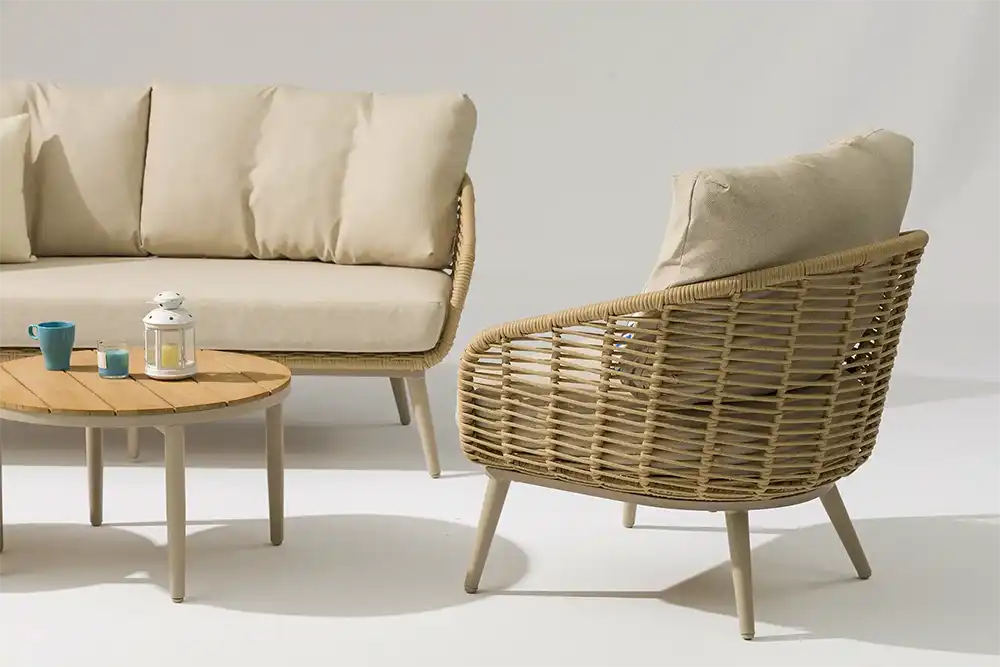 Stylish Vinci COCO garden sofa with beige cushions for outdoor relaxation.