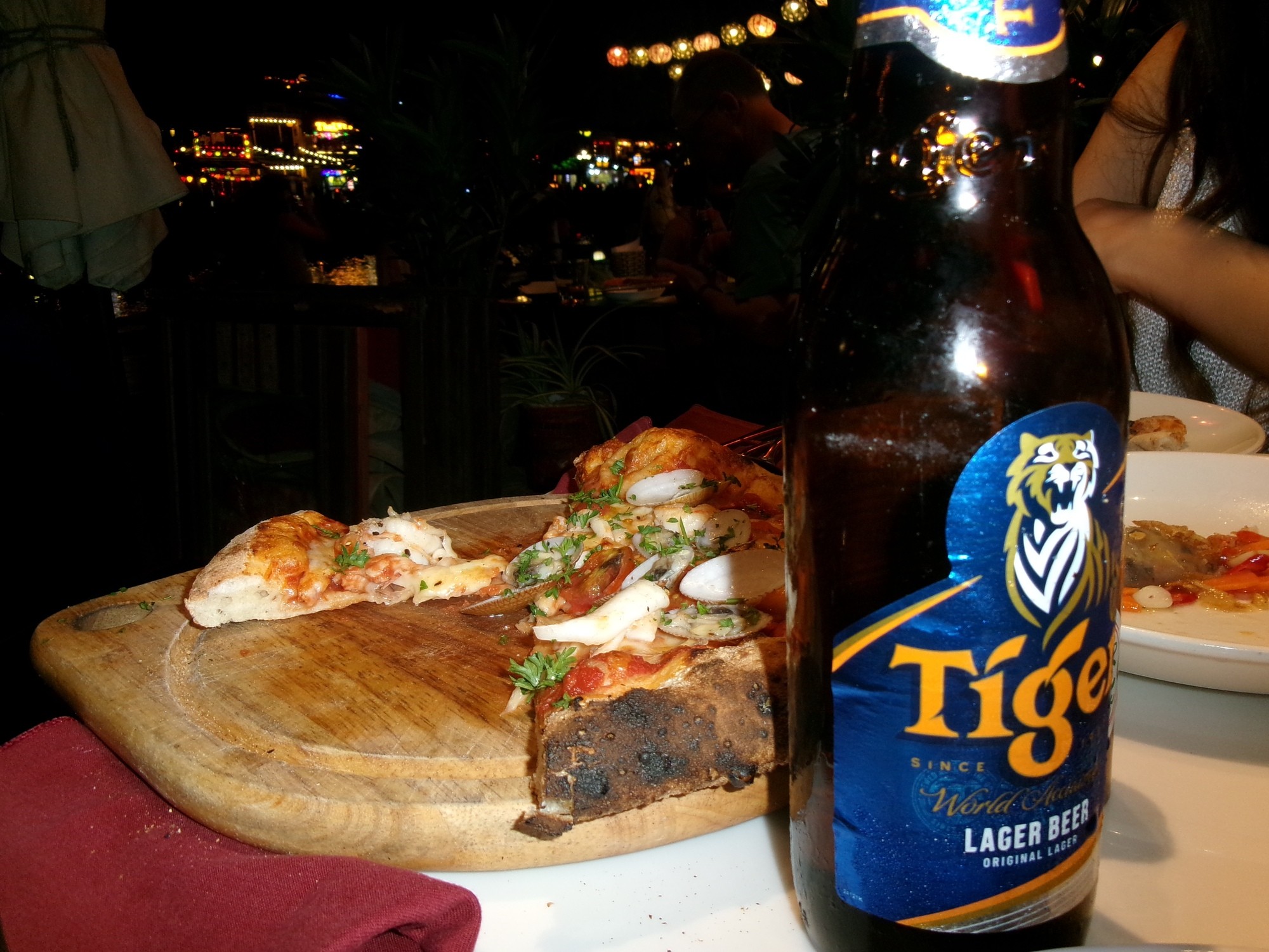 brown wooden beach lounge chair on beach during daytime