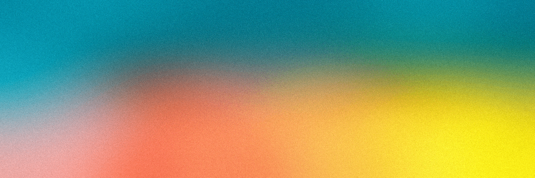 a blurry image of a rainbow colored background