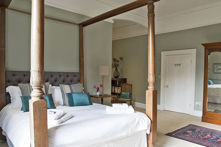 Hartingtons Heritage Tours hotel, Darley House, relaxing bedroom with four poster bed
