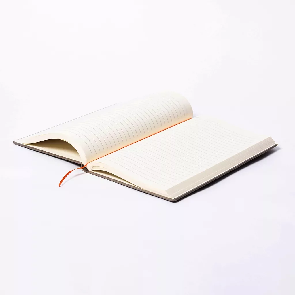 Branded A5 journal with elastic ribbon detail