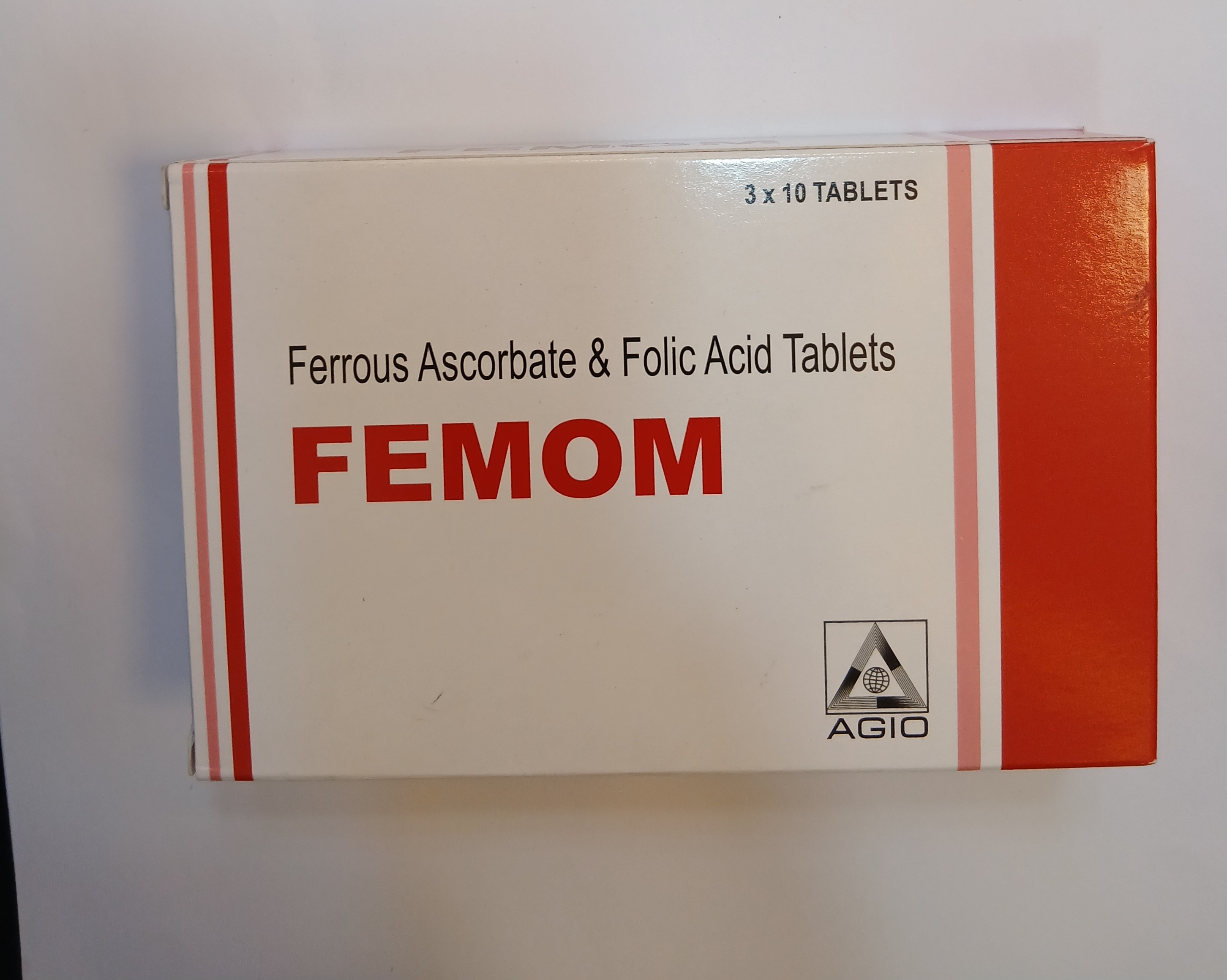 White and red cardboard packaging displays three blister packs, each containing ten tablets, with printed text indicating "Ferrous Ascorbate & Folic Acid Tablets.