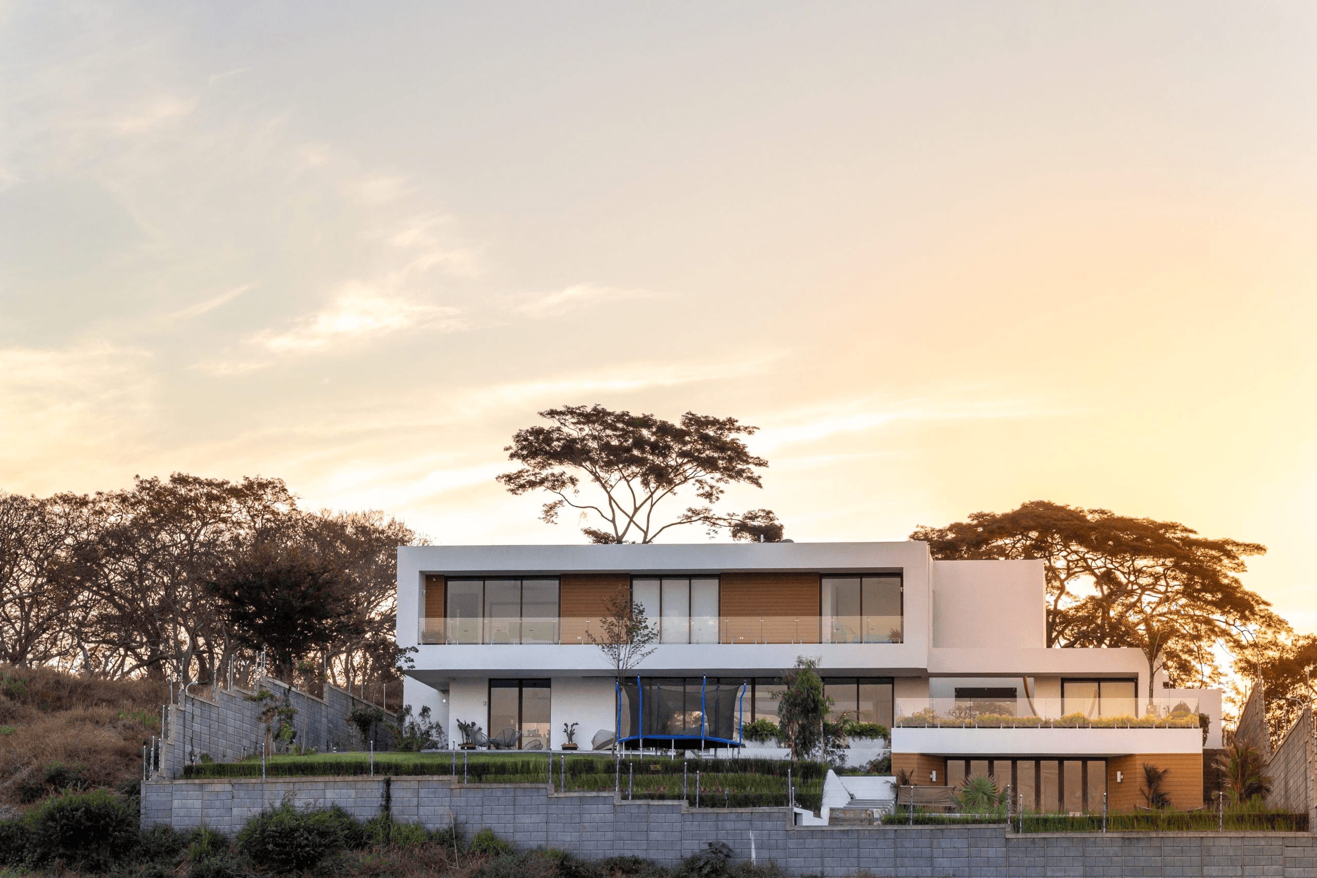 Contemporary two-level residence with green roof — Summit House by Hurtado Arquitectos, Managua Nicaragua
