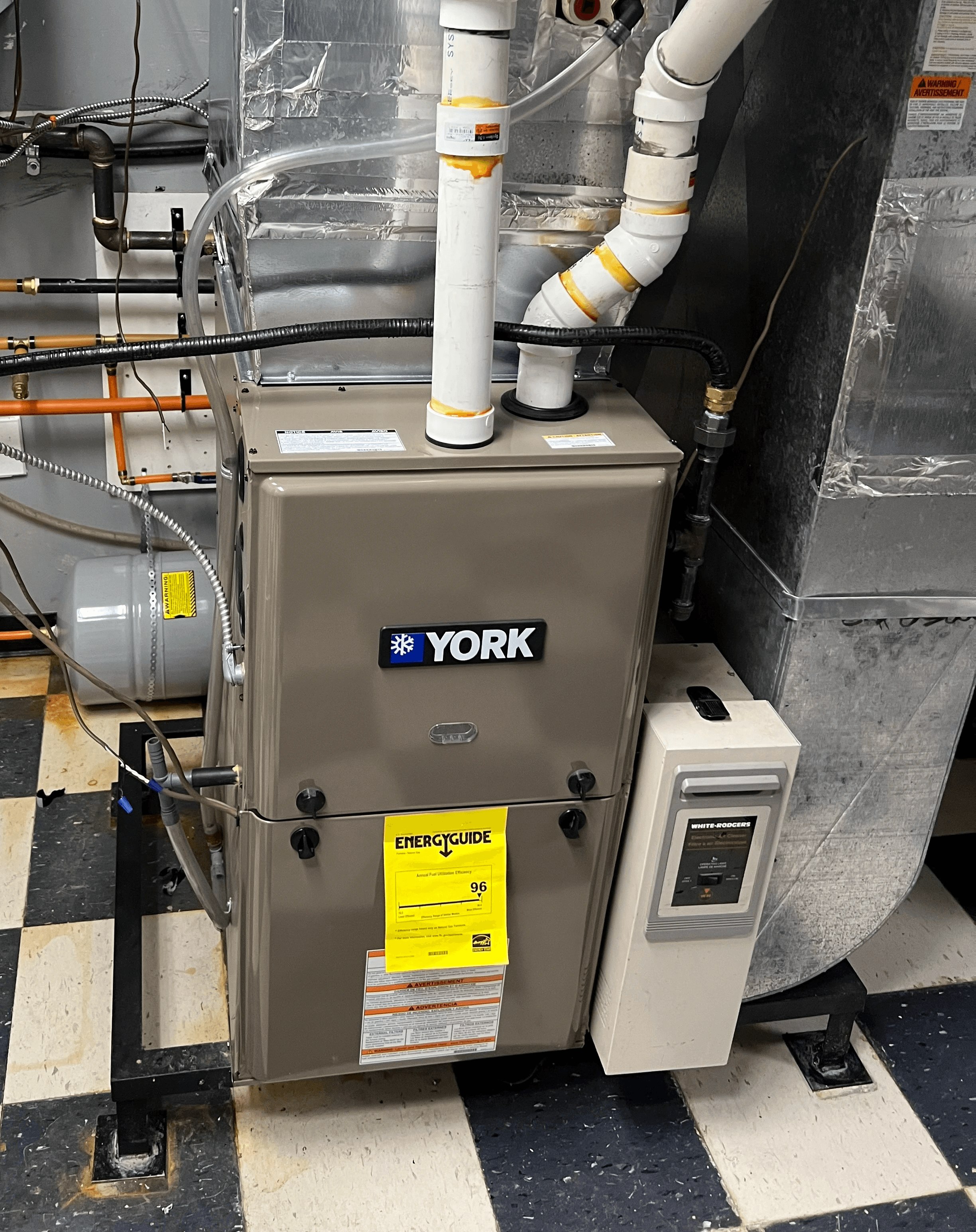 Emergency furnace repair in progress on residential heating system in Mississauga