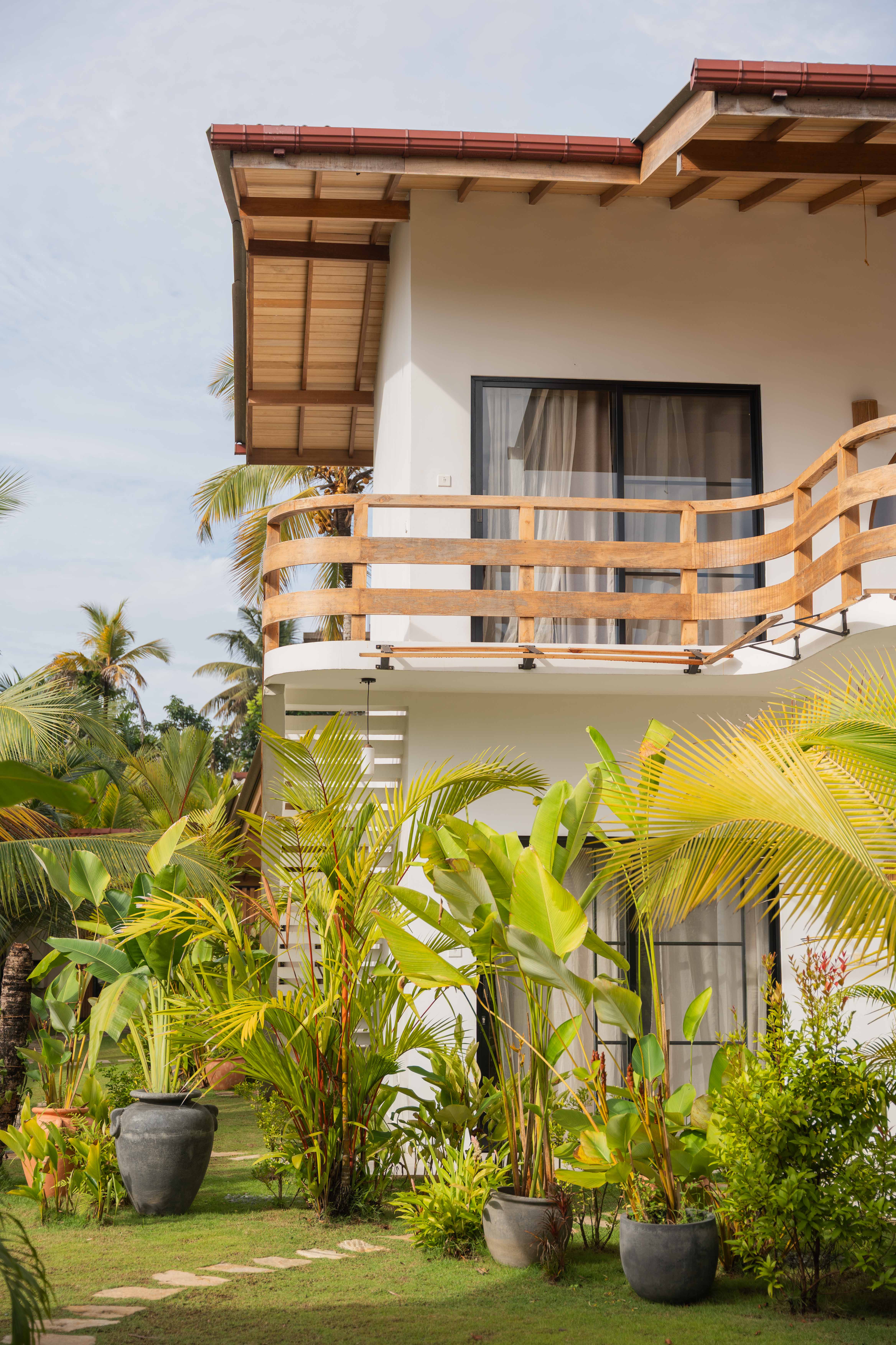 Two girls relaxing and floating in the pool from a bird view