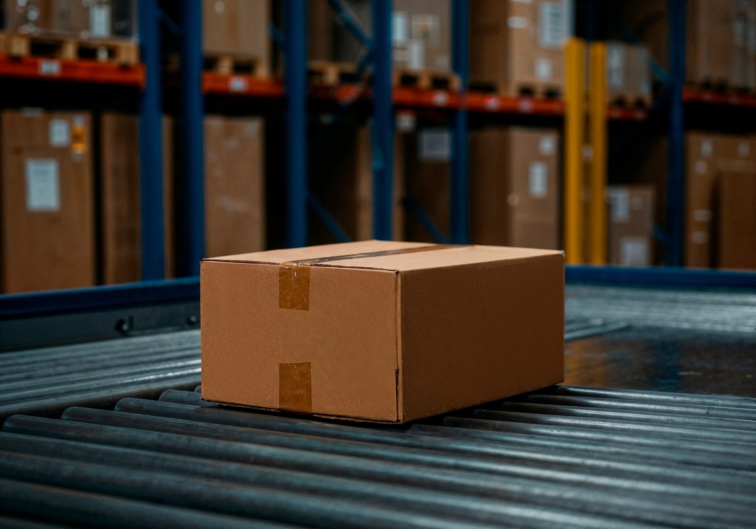 Warehouse team handling parcels during logistics operations