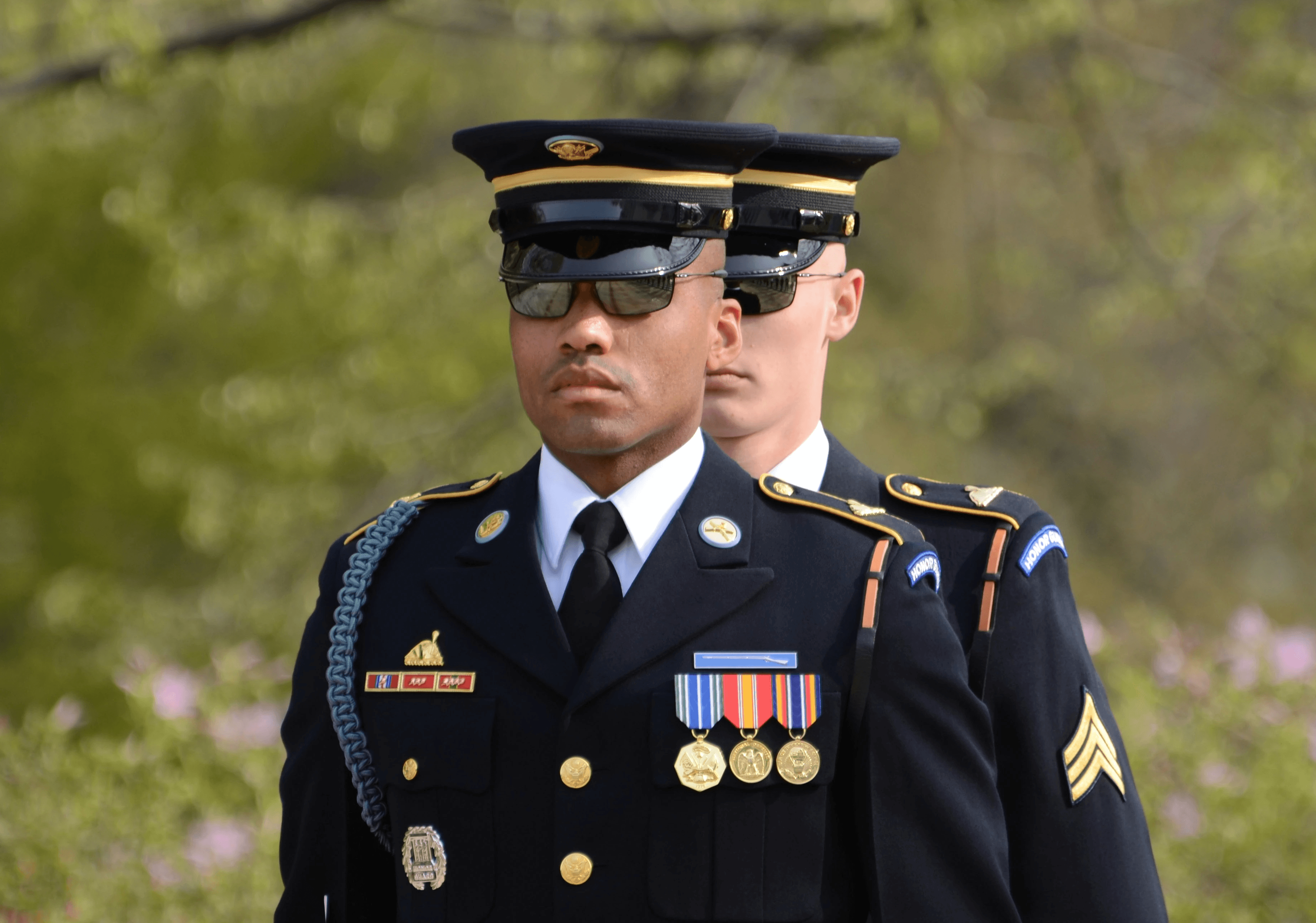 man in black and brown camouflage military uniform