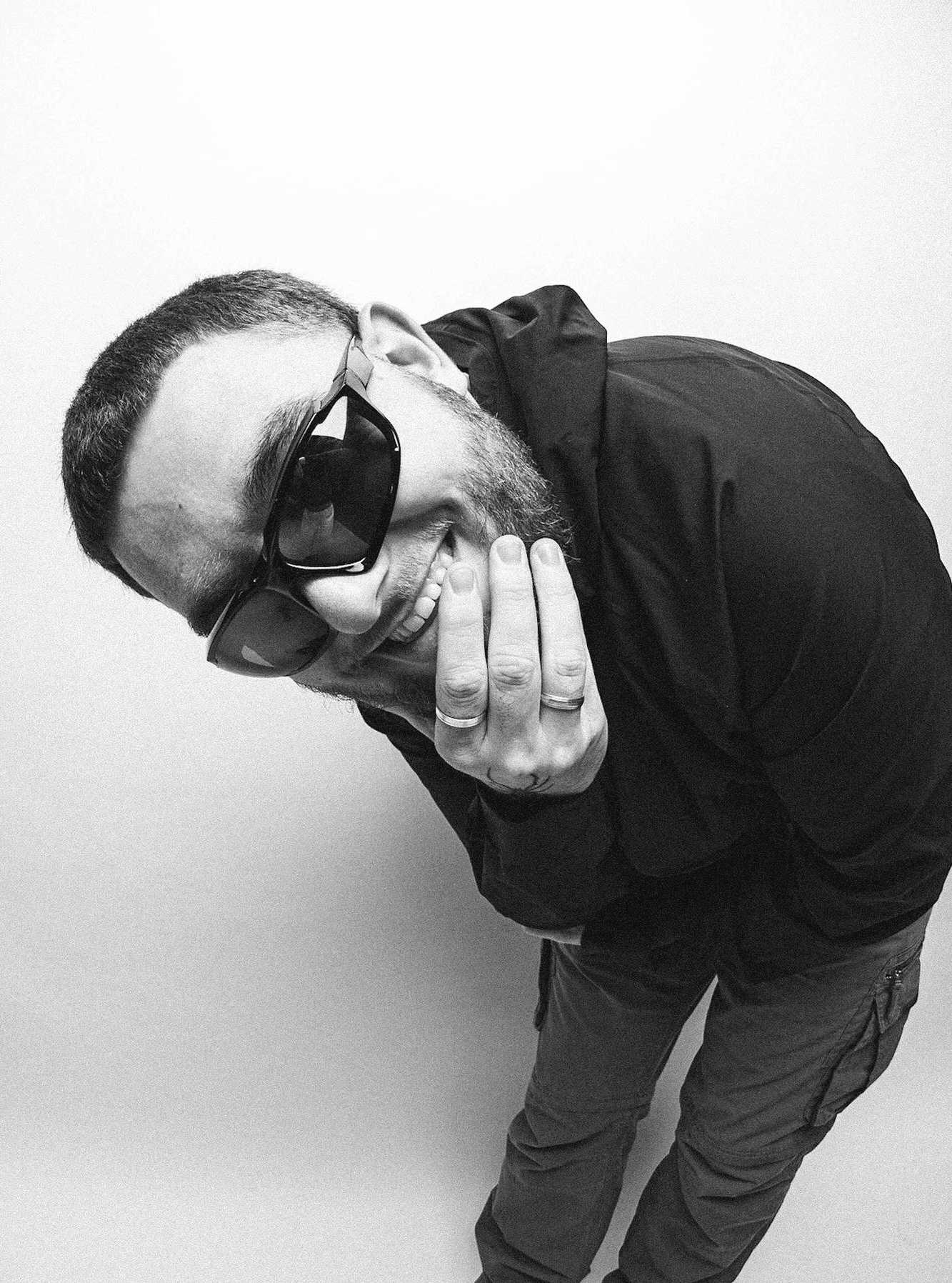 a blurry photo of a person standing in front of a wall