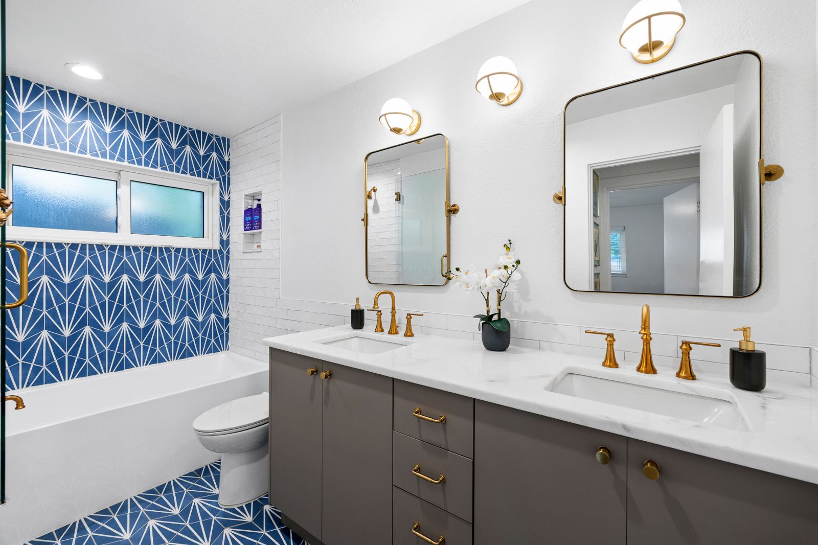 Primary bath, marble and brushed gold
